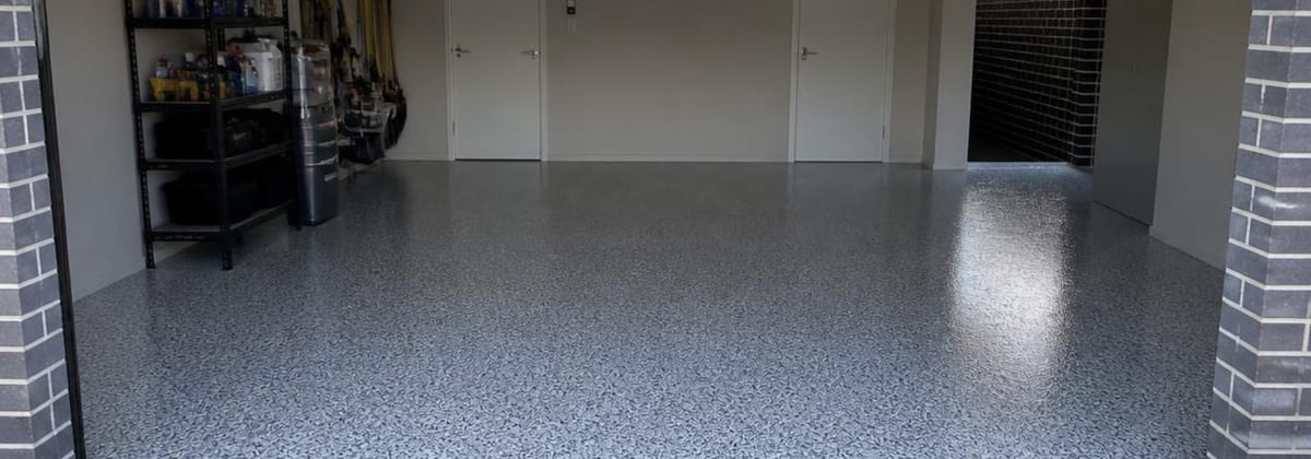 Finished flake epoxy floor in a residential garage